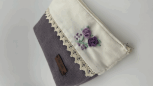 Embroidered Toiletry Pouch حقيبة مطرزة لمستحضرات التجميل